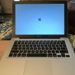 Silver MacBook brand new battery and charger cable